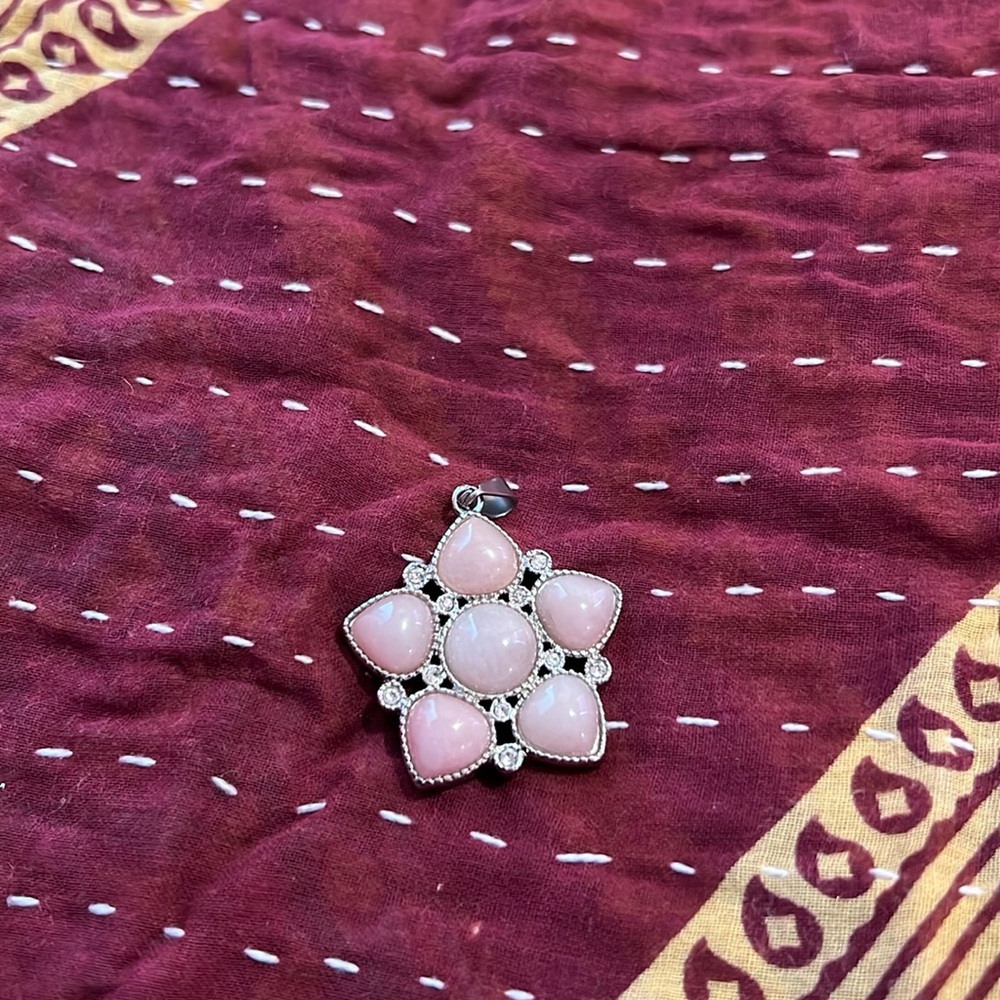 Rose quartz on stainless steel